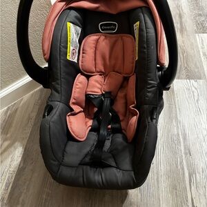 Evenflo Coral and Black Infant Car Seat